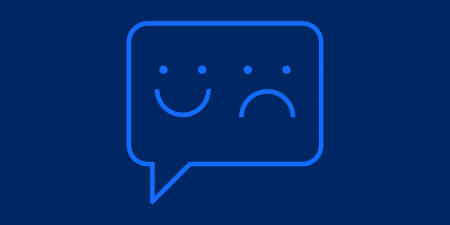 Light blue outline of a speech bubble on a navy background. Inside the speech bubble is a smiling face and a sad face.
