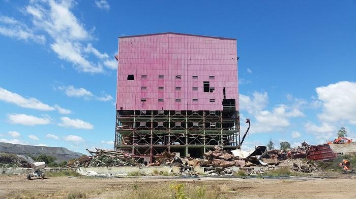View of millhouse from the ground during demolition