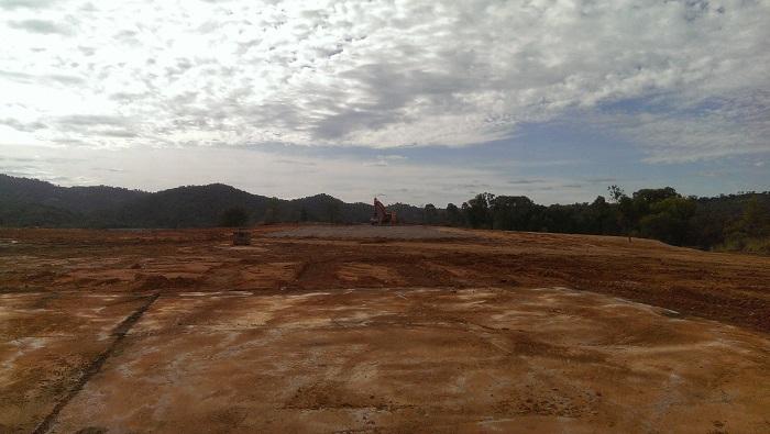 Woodsreef after demolition, containment cell in background